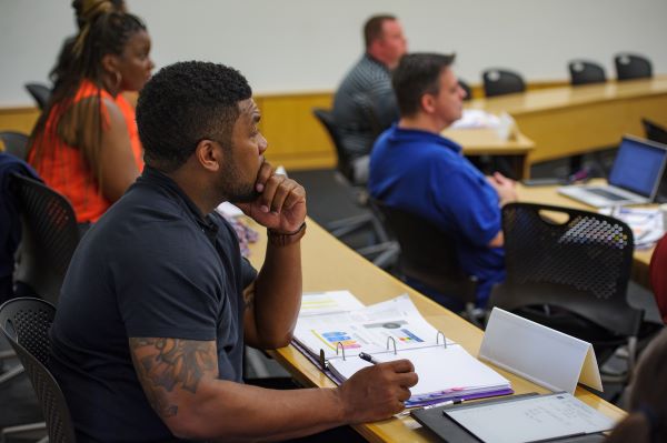 Students listen in classroom 