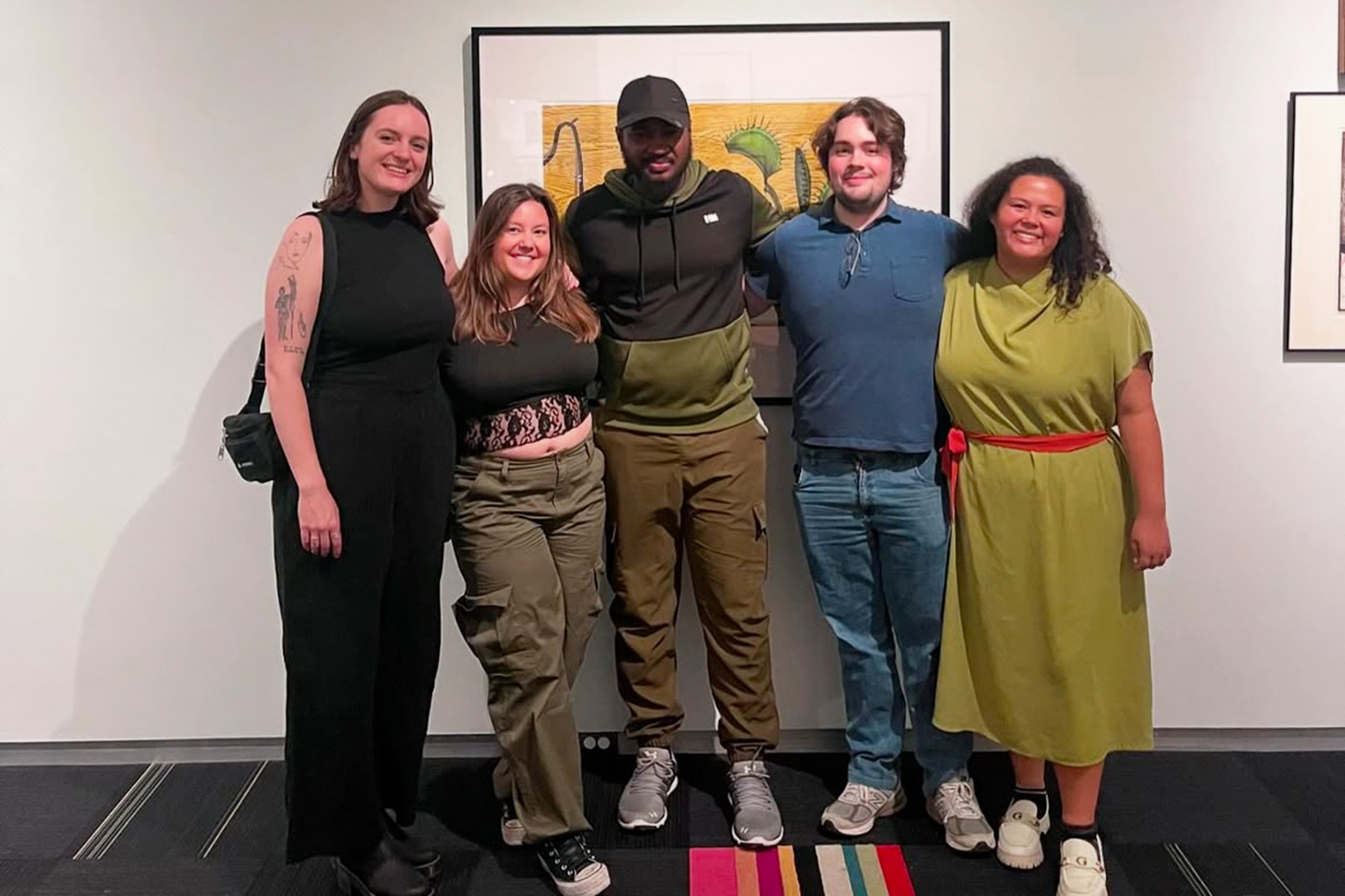Marcus posing with members of the MPA cohort at the Baton Rouge Gallery.