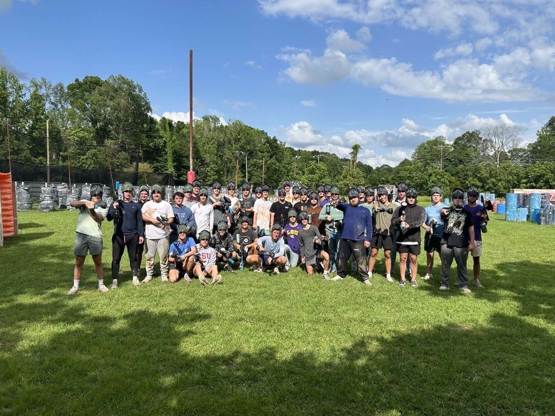 pi kappa alpha members at sports game